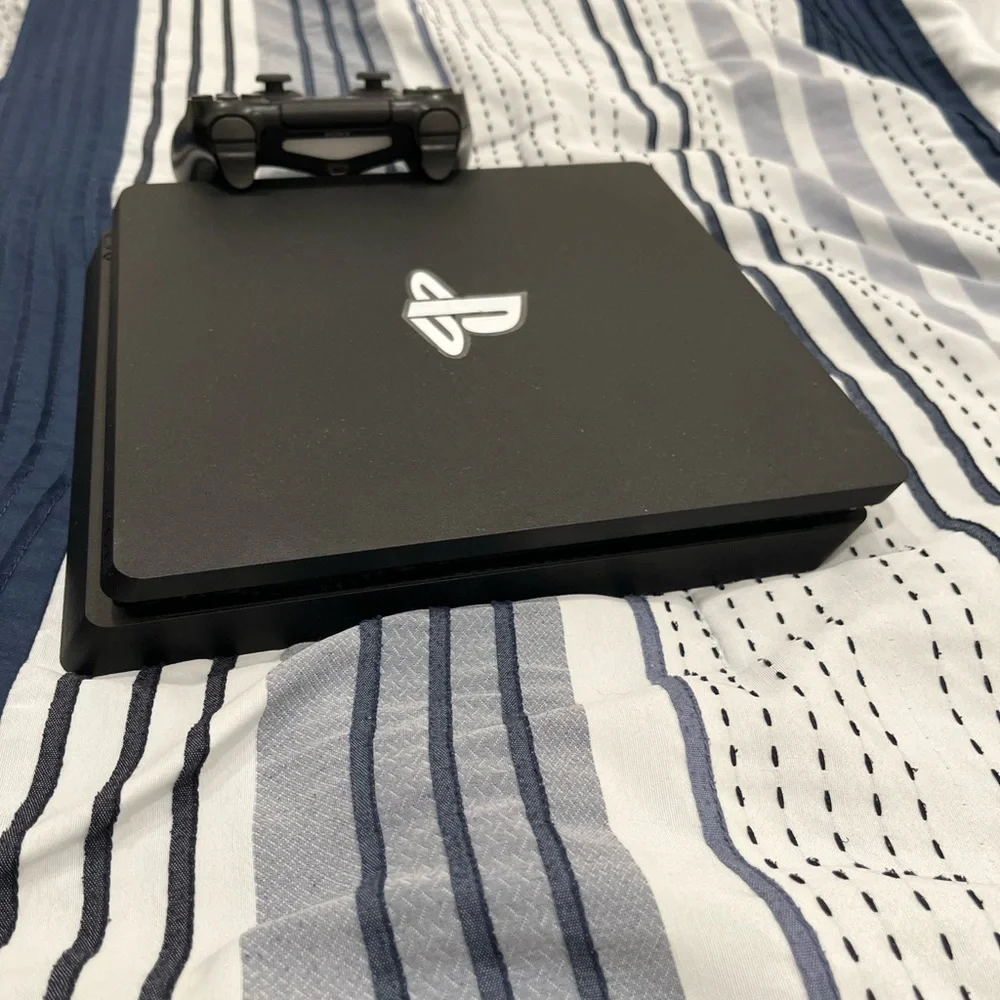 PS4 system with controller and 1 game